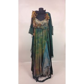 Sukienka guślarki, zielona, z wieloma przeszyciami, z złączonych tkanin, z doszytymi ozdobami